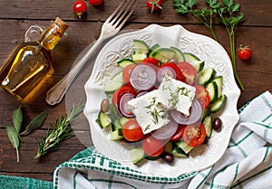 Greek salad and ingredients top view