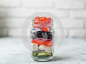 Greek Salad in mason jar, copy space