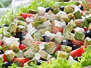 Greek Salad with olives, avocado and feta.