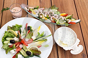 Greek salad and shrimp cocktail