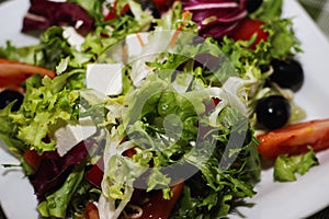 Greek salad tomatoes cheese greens