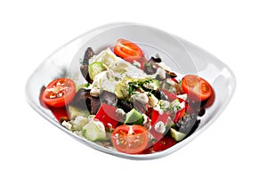 Greek salad. Vegetable with shitake mushrooms, green salad, with cherry tomatoes, fetta cheese, red onion, and mixed photo