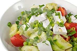 Greek Salad in White Bowl, Macro Photo of Fresh Garden Salat, Salad with Green Onion, Feta, Tomatoes Closeup