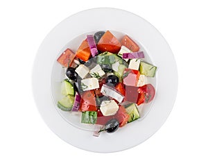 Greek salad and in white glass plate isolated on white