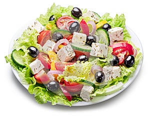 Greek salad on white plate isolated on white background. File contains clipping path photo