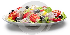 Greek salad on white plate isolated on white background. File contains clipping path photo