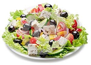 Greek salad on white plate isolated on white background. File contains clipping path photo