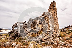 Greek style old windmill in Kimolos island, Cyclades photo