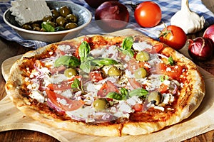 Greek Style Pizza with feta cheese, olives and tomatoes