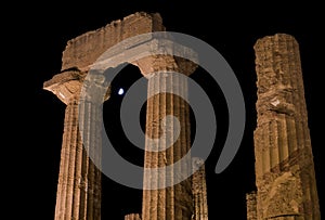 Greek Temple capitals at the moonlight in Agrigento, Sicily