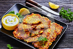 Greek tzatziki sauce and crispy onion latkes