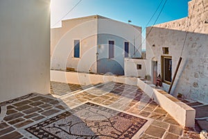 Greek village typical view with whitewashed houses. Plaka town, Milos island, Greece