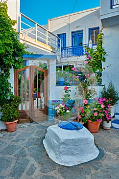 Greek village typical view with whitewashed houses and stairs. Plaka town, Milos island, Greece