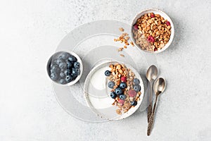 Greek yogurt bowl with granola and berries