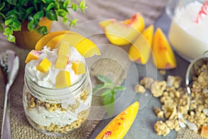 Greek yogurt with granola and peach