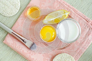 Greek yogurt sour cream or kefir, raw egg, lemon and olive oil. Homemade beauty treatments recipe.