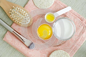 Greek yogurt sour cream or kefir, raw egg and olive oil.Homemade beauty treatments recipe.