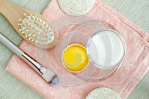 Greek yogurt sour cream or kefir and raw egg for preparing diy face and hair masks, scrubs and moisturizers.