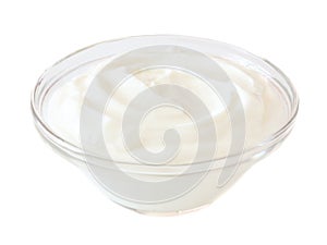 Greek yogurt in transparent bowl isolated on white