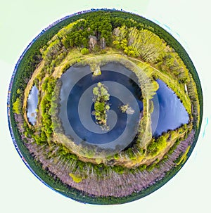 Green 360 little planet with trees, white clouds and soft blue sky. three lakes in a green forest Tiny planet of