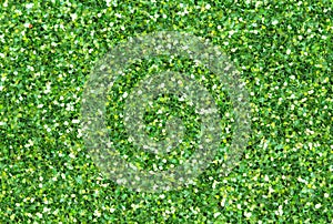 Green abstract background. Christmas glitter closeup photo.