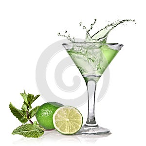 Green alcohol cocktail with splash