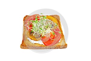 Green alfalfa sprouts,fresh tomatoes on toasted slices of wholegrain bread isolated on a white