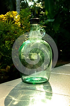 Green antique bottles and reflex light.