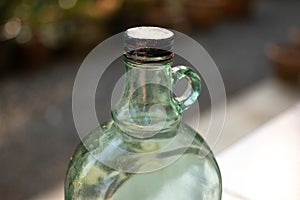 Green antique bottles and reflex light.