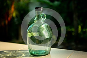 Green antique bottles and reflex light.