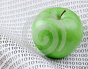 Green apple and binary code