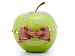 Green apple with bow-tie