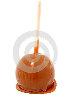 Green Apple covered in caramel, clipping path photo