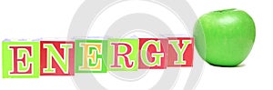 Green apple and cubes with letters - energy