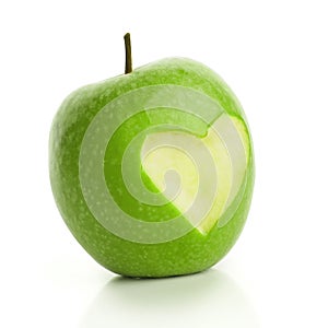 Green apple with cut heart