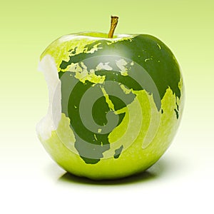 Green apple with earth map