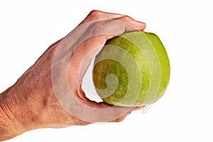 Green apple hold by white male hand.