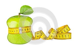 Green apple measuring tape diet concept