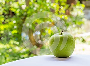 Green apple on nuture background