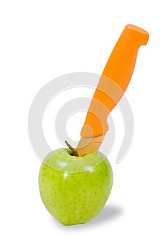 Green apple and orange knife
