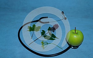 Green apple, stethoscope