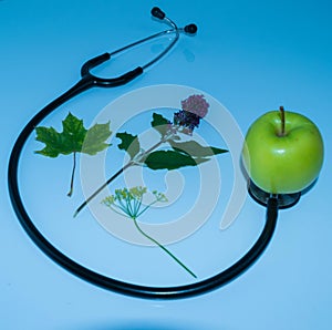 Green apple, stethoscope