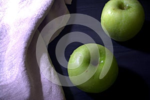Green apple on the table