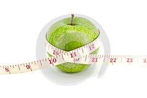 Green apple with tape