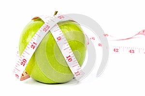 Green apple and white tape