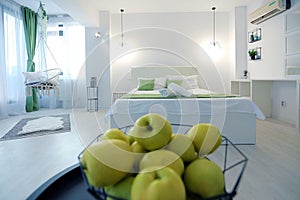 Apples in a fruit bowl in the bedroom, studio room