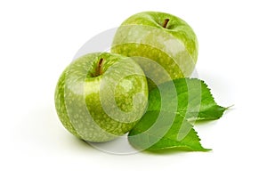 Green apples granny smith with leafs, isolated on white background