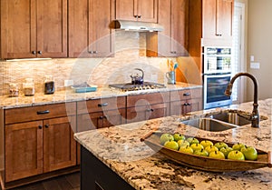 Green Apples on New Granite Countertop