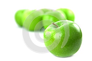 Green apples on white background