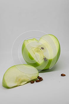 Green apples on a white background